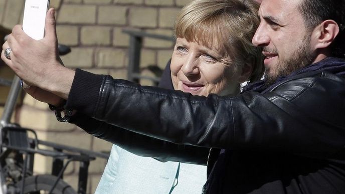 Německá kancléřka Angela Merkelová s migrantem Německá kancléřka Angela Merkelová s migrantem