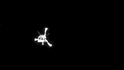 Fotka modulu Philae při sestupu na kometu (foceno ze sondy Rosetta) Fotka modulu Philae při sestupu na kometu (foceno ze sondy Rosetta)