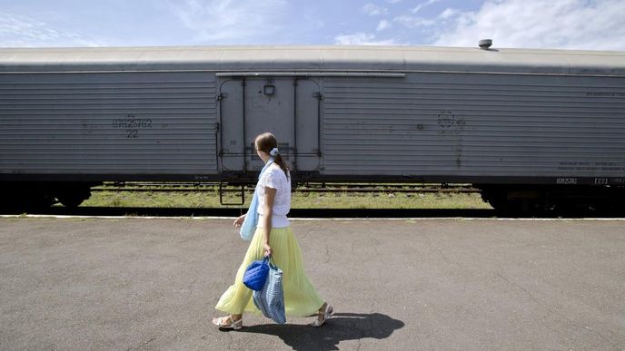 Vagon s těly obětí letu MH17 na nádraží východoukrajinského města Torez Vagon s těly obětí letu MH17 na nádraží východoukrajinského města Torez