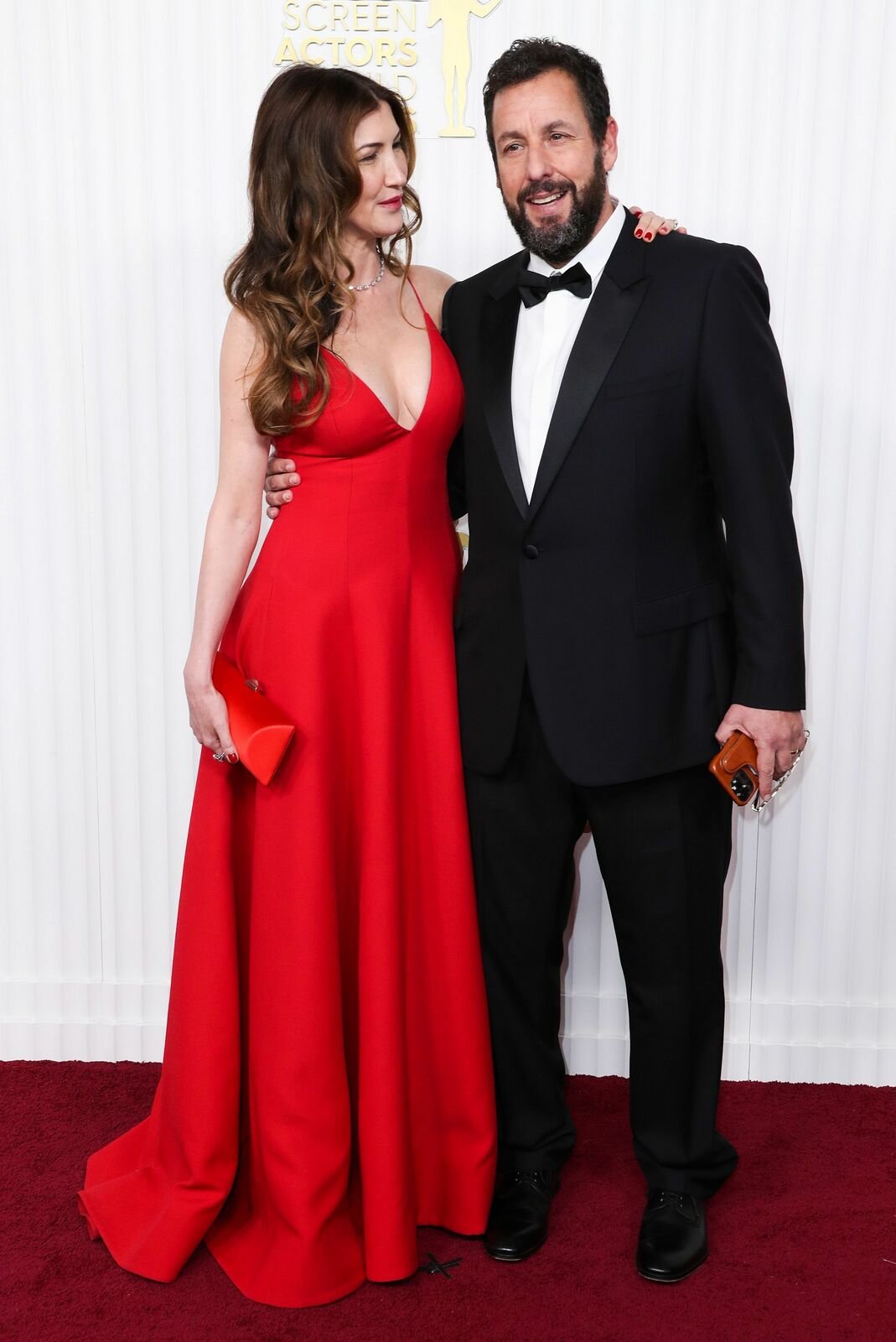 Adam Sandler s manželkou.