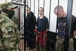 Britové Aiden Aslin a Shaun Pinner a Maročan Saadun Brahim byli v Doněcké lidové republice odsouzeni (9.6.2022).