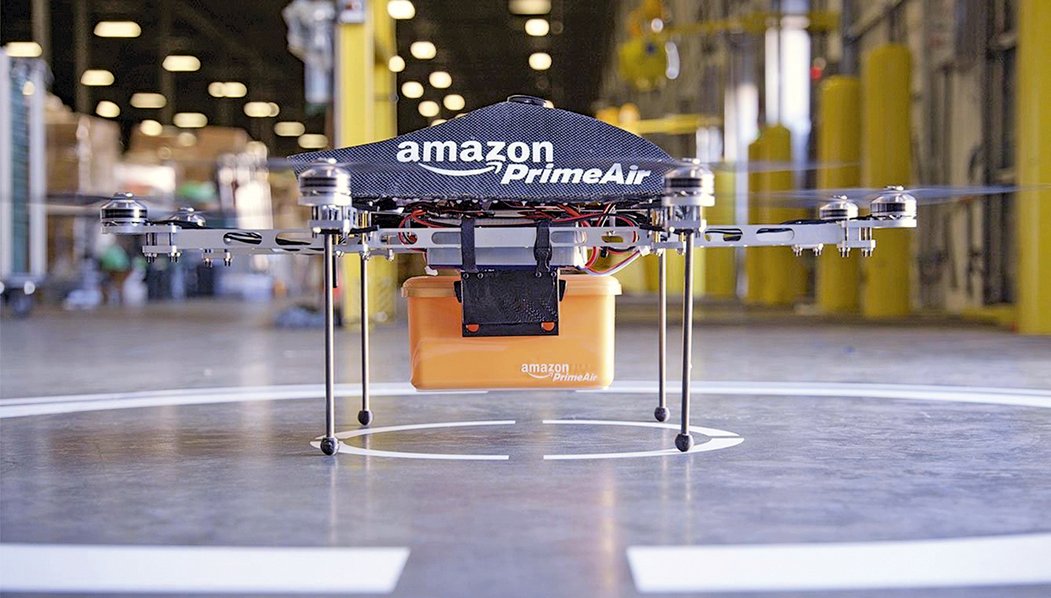 Amazon v současnosti intezivně testuje doručování zboží prostřednictvím leteckých dronů. Společnost také začala spolupracovat s Úřadem Spojeného království pro civilní letectví, kde se v rámci testování chce zaměřit na provozní vlastnosti a senzory pro detekci překážek