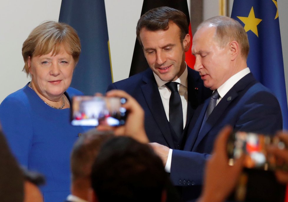Angela Merkelová, Emmanuel Macron a Vladimir Putin (10.12.2019)