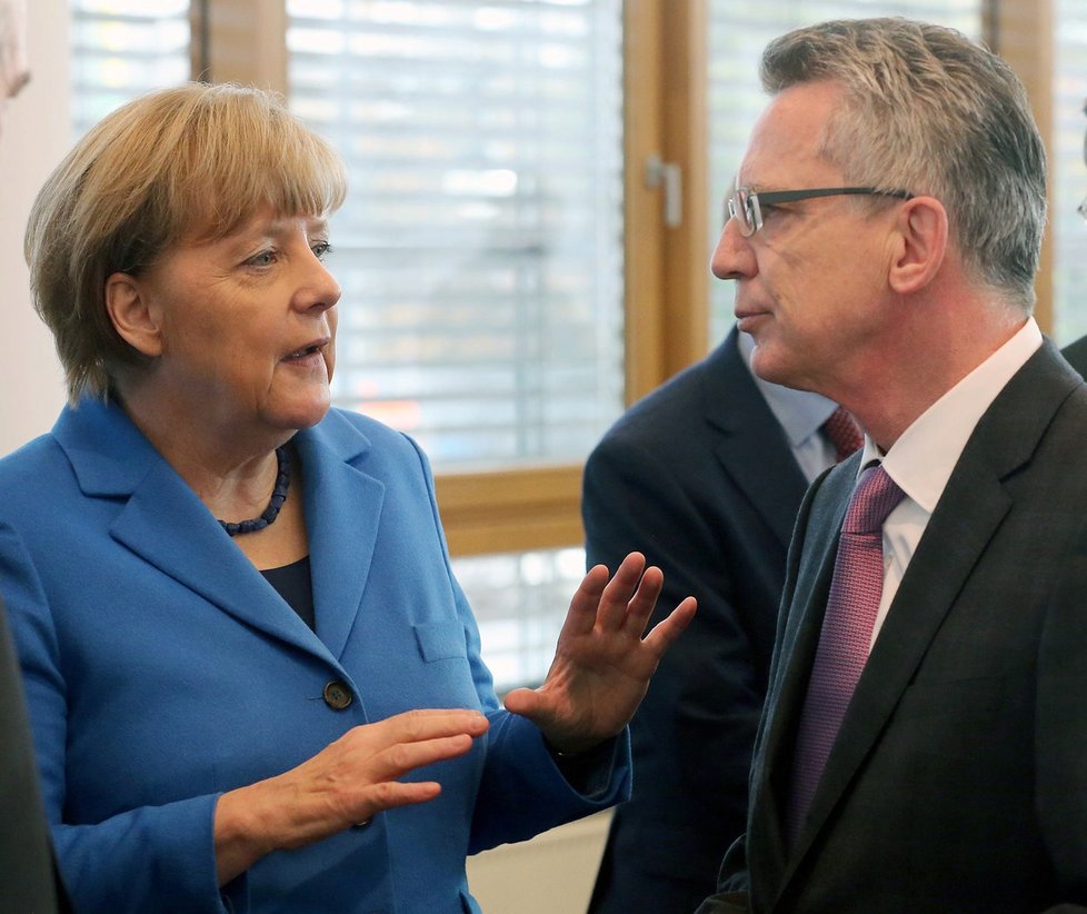 Německá kancléřka Angela Merkelová a ministr vnitra Thomas de Maiziére