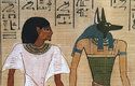 Anubis, egyptský bůh se šakalí hlavou, doprovázel duše zemřelých do podsvětí