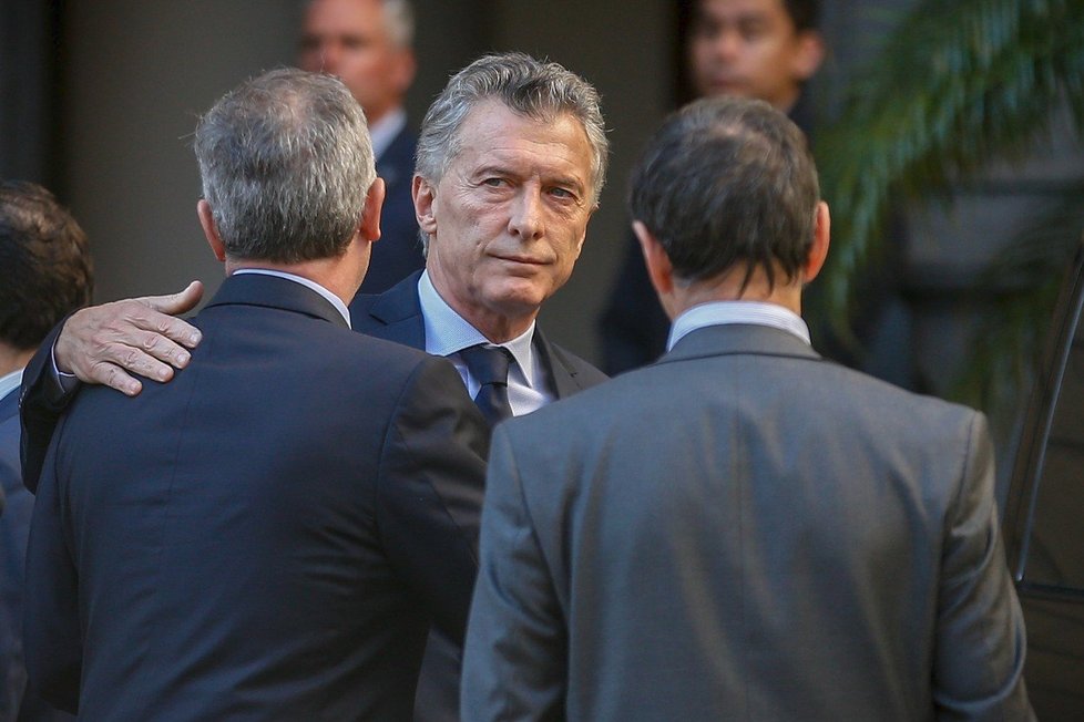 Mauricio Macri (uprostřed) na pohřbu zastřeleného poslance