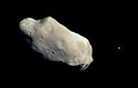 Asi nejslavnější planetka Ida s měsícem Dactyl. Planetku objevil v roce 1884 rodák z Opavy Johann Palisa. Má průměr 15 km, měsíc 1,4 km