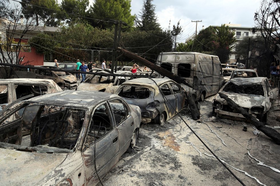 Pozůstatky po požárech v řeckých Athénách.