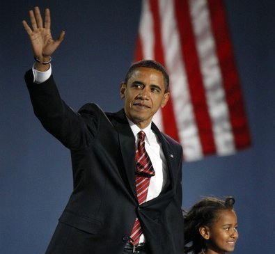 Barack Obama s dcerou Sashou (7) při volební noci