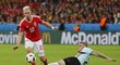 Záložník Walesu Aaron Ramsey v akci proti Belgii
