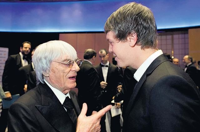 Bernie Ecclestone a Sebastian Vettel (vpravo).