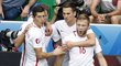Fotbalisté Polska slaví gól Jakuba Blaszczykowskiho proti Švýcarsku