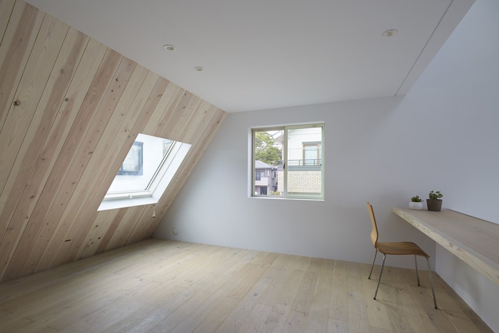 Minimalistická rezidence elegantně propojuje interiér s okolním prostředím