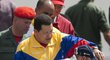 Hugo Chávez se přišel podívat na jezdce Pastora Maldonada.