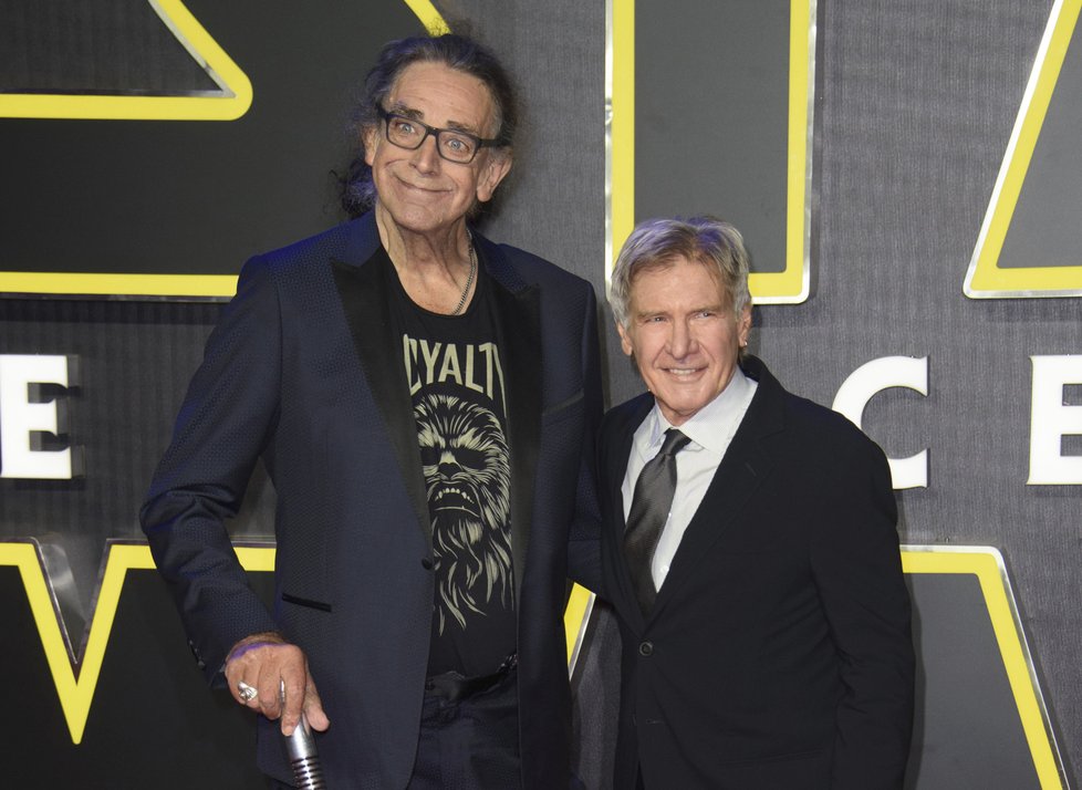 Peter Mayhew (†74) a Harrison Ford.