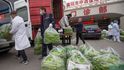 Koronavirus ovlivňuje život v celé Číně. Lidé nosí roušky a masky v práci i na nákupech