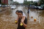 Záplavy v Pekingu.