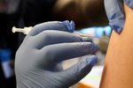 Očkování třetí dávkou vakcíny proti covidu v USA (21.12.2021)