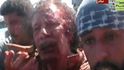 2011 -Libyjský diktátor Muammar Kaddáfí těsně před tím, než bude popraven povstalci