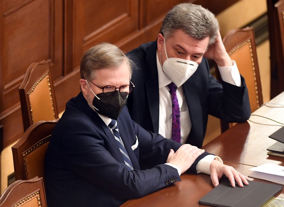 Sněmovna hlasuje o důvěře vlády: premiér Petr Fiala a ministr spravedlnosti Pavel Blažek (12.1.2022)