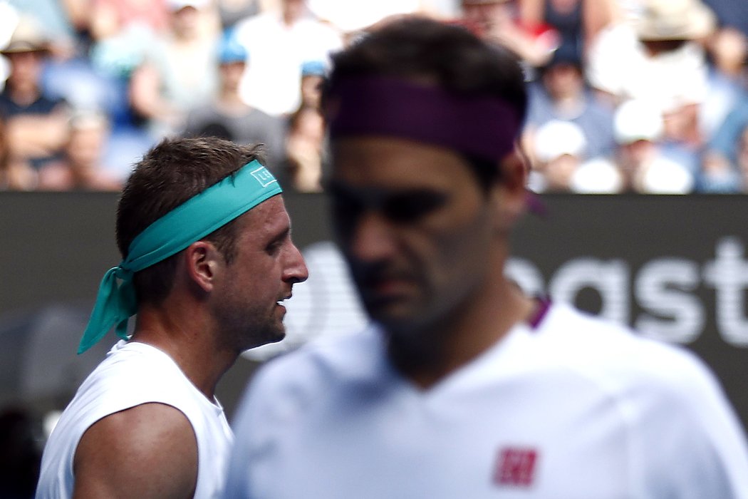 Roger Federer a Tennys Sandgren