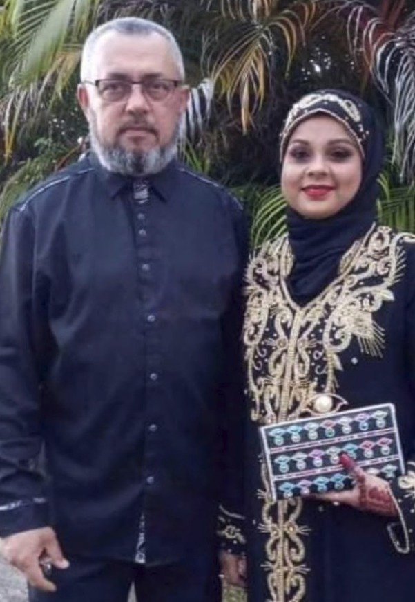 Novozélandský šarlatán Muhammad Rahíš Isúf (62) s manželkou.