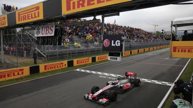 Jenson Button v cíli Velké ceny Kanady (2011)