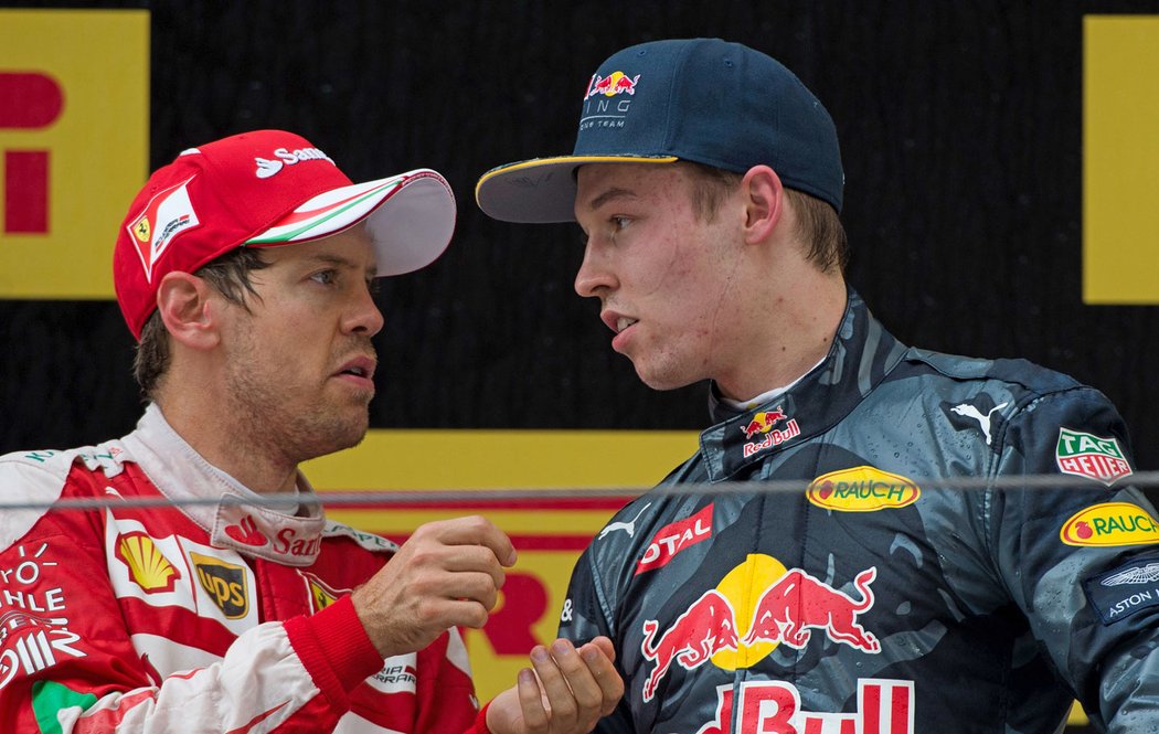 Sebastian Vettel a Daniil Kvjat