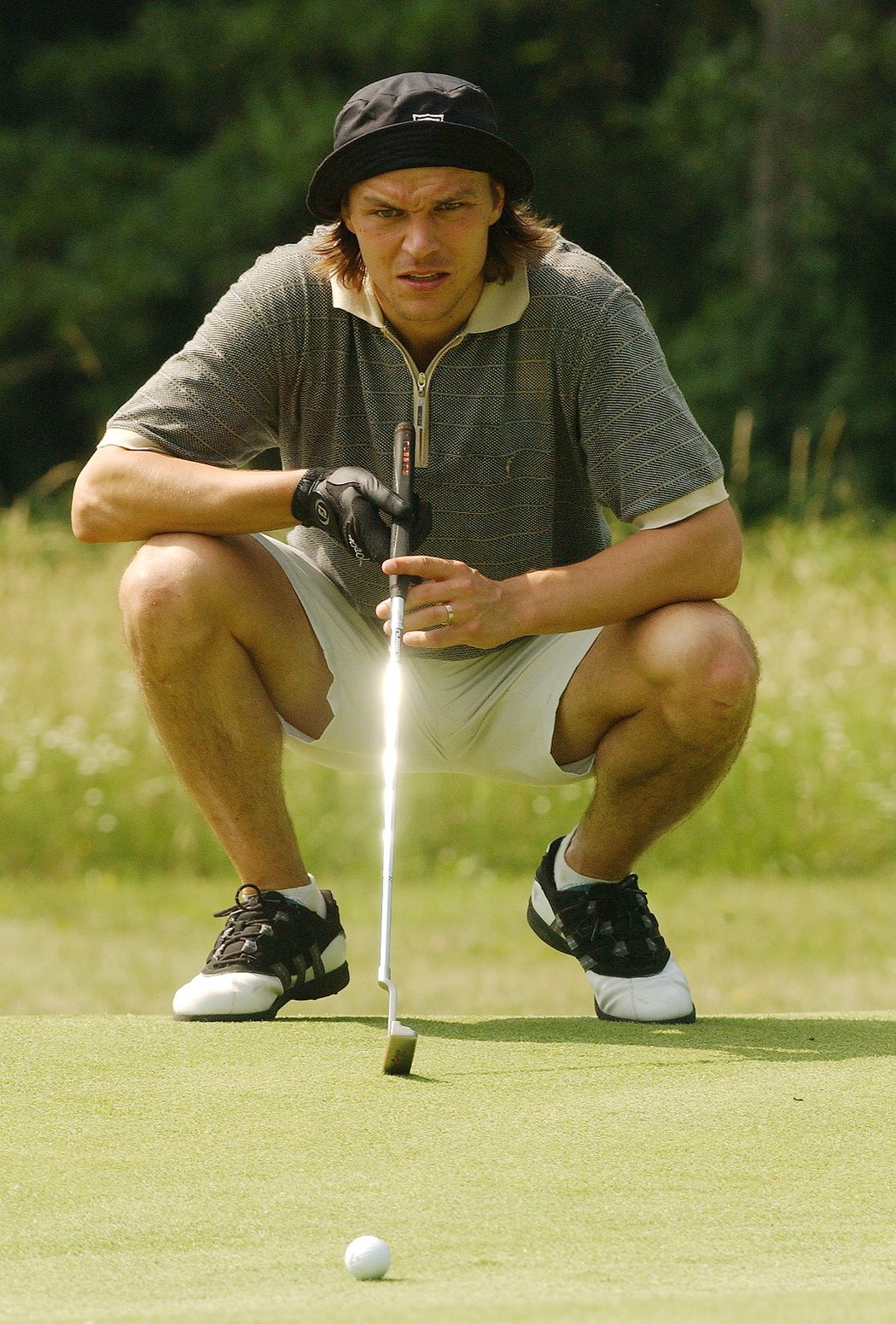 2003. Fotbalisté mají rádi golf, Tomáš Ujfaluši nebyl výjimka.