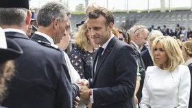 Francouzský prezident Macron s manželkou během oslav dobytí Bastily.