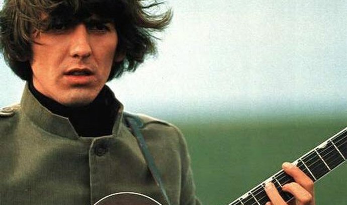 George Harrison, další člen The Beatles a osobnost hry na kytaru.