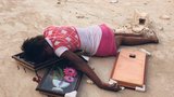 Haiti: Zabili jí kvůli třem obrázkům