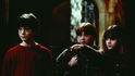 Daniel Radcliffe, Rupert Grint a Emma Watsonová ve filmu Harry Potter a Kámen mudrců