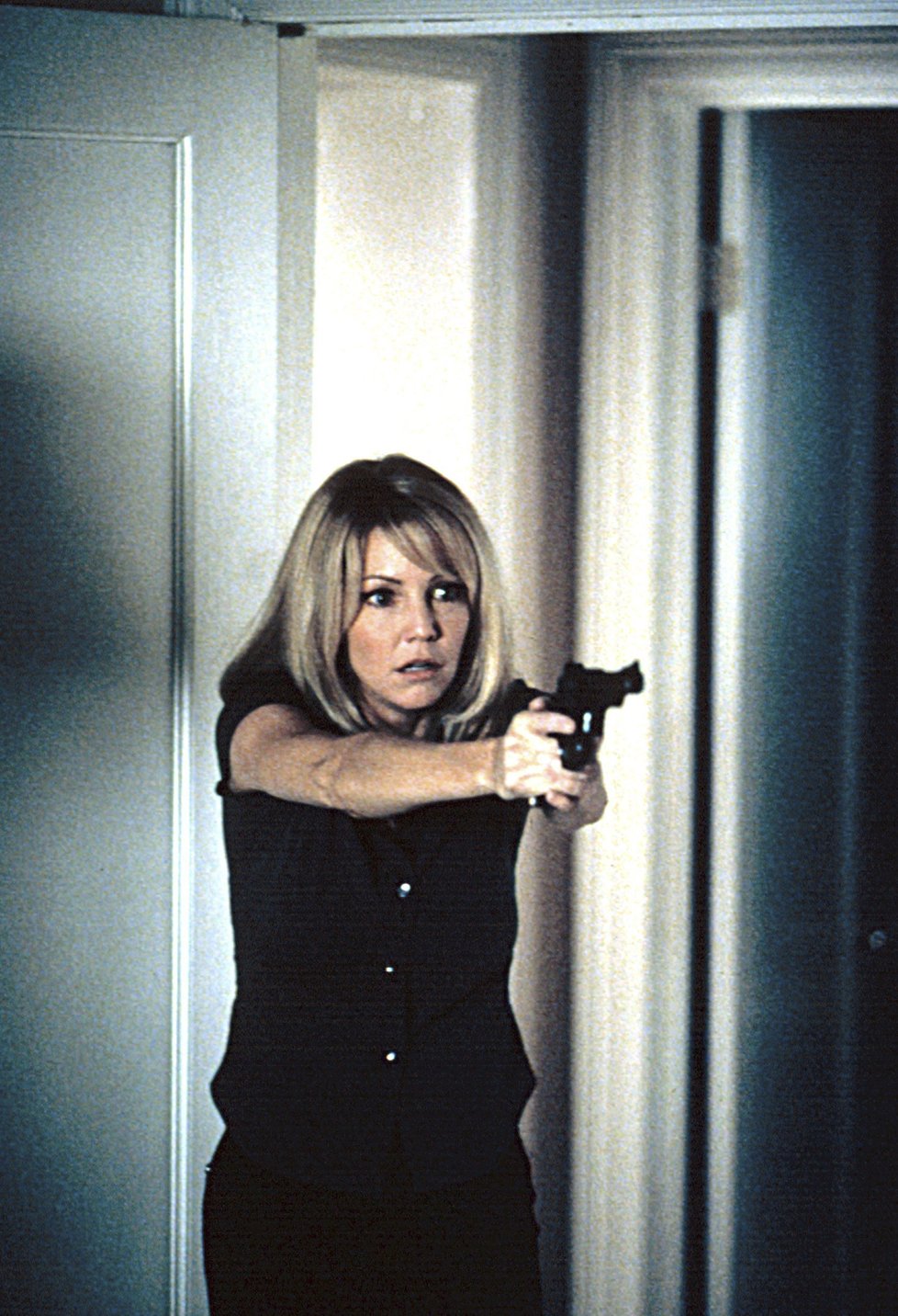 1990 S pistolí se oháněla už jako Amanda v Melrose Place.