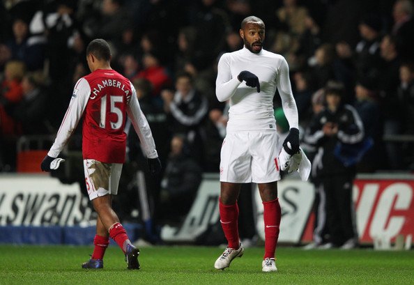Thierry Henry při ostré slovní výměně s fanouškem Arsenalu.