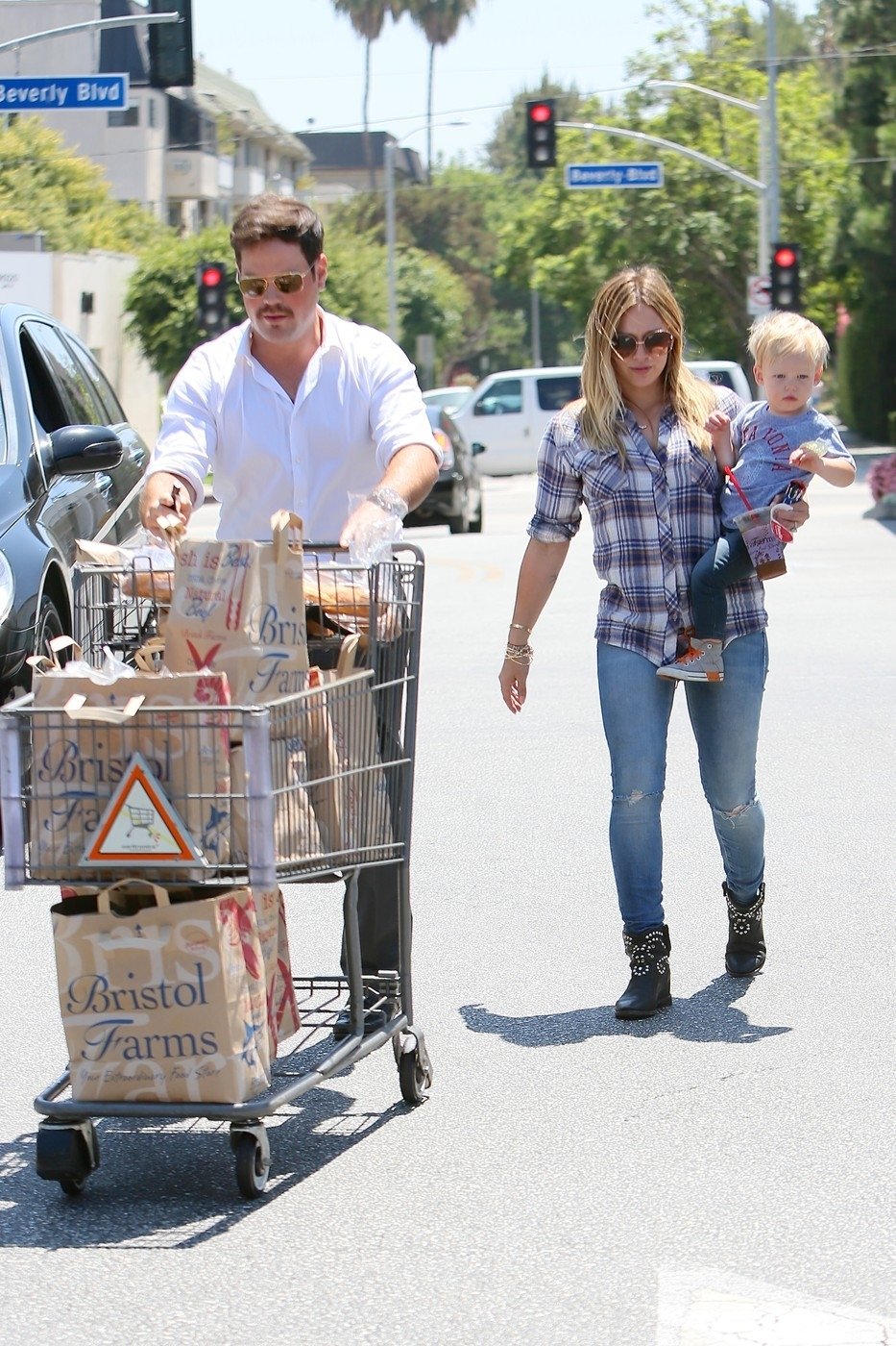 Hilary Duff, její manžel Mike Comrie a dcera Luca.