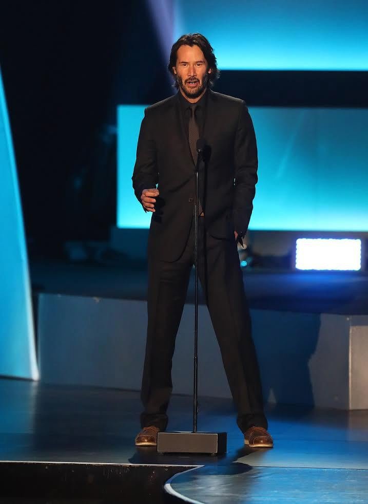 Herec Keanu Reeves při slavnostním galavečeru NHL