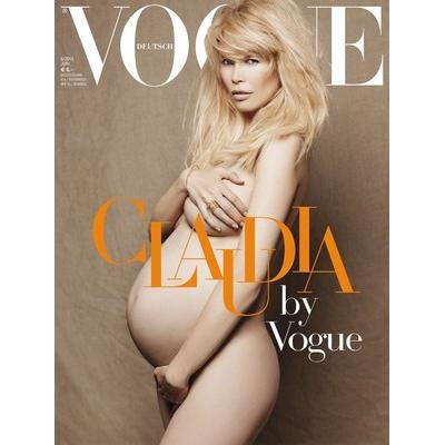 Těhotná modelka si na obálce časopisu hladí své kulaté bříško.