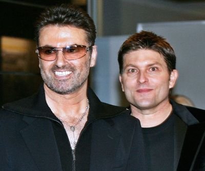 George Michael a jeho stálý přítel Kenny Goss.