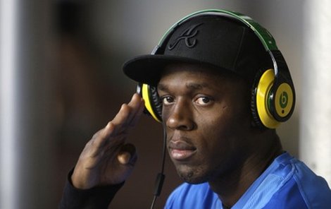 Usain Bolt je miláčkem celé Zlaté tretry, vděčné fotoreportéry nevyjímaje. Má pro ně vždy nějakou »švejkovinu«.