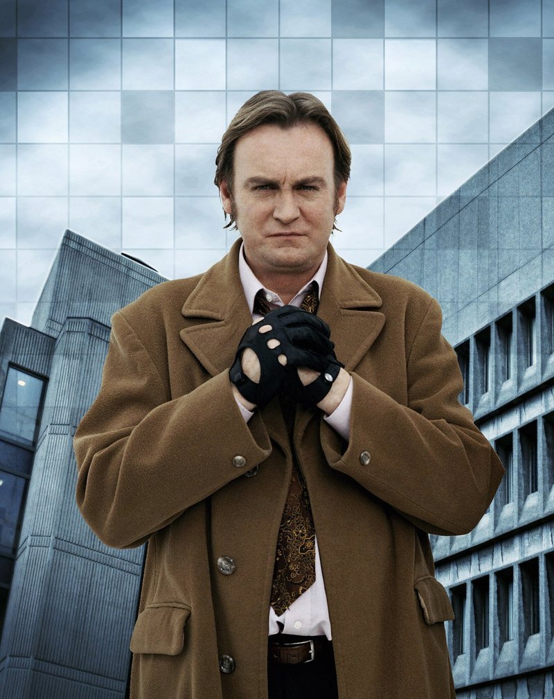 Anglický herec Philip Glenister, který hraje drsného ranaře.