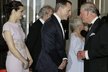 Britain&#39;s Prince Charles (R) talks to actors Daniel Craig (2nd L) and Rachel Weisz (L) as they arrive for the royal world premiere of the new 007 film