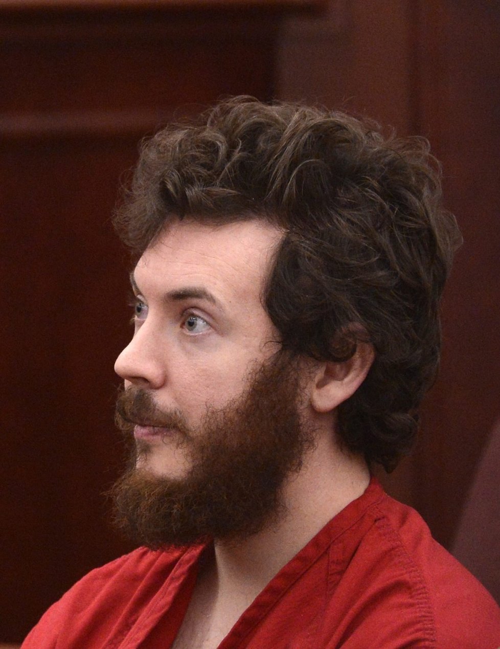 James Holmes změnil ve vazbě účes, výraz šílence mu ale zůstal.