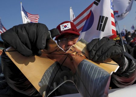 Demonstrace proti přítomnosti severokorejské delegace na ZOH.