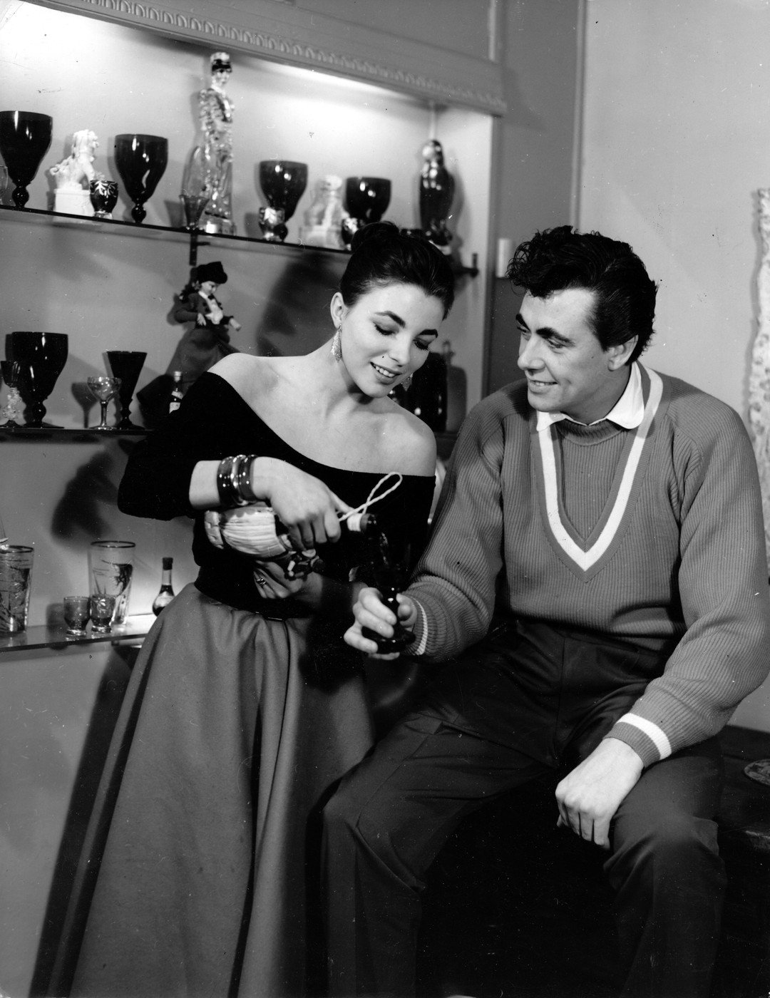 Joan Collins a Maxwell Reed 
