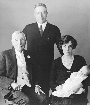 John D. Rockefeller senior se synem Johnem a jeho rodinou.