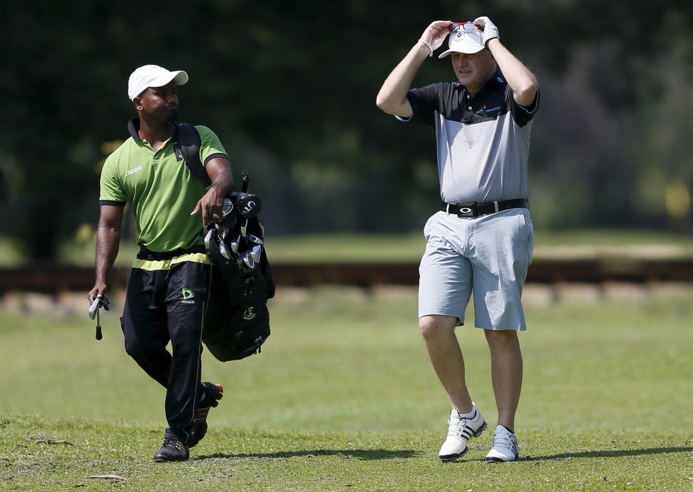 Novozélandský ministerský předseda John Key na golfu