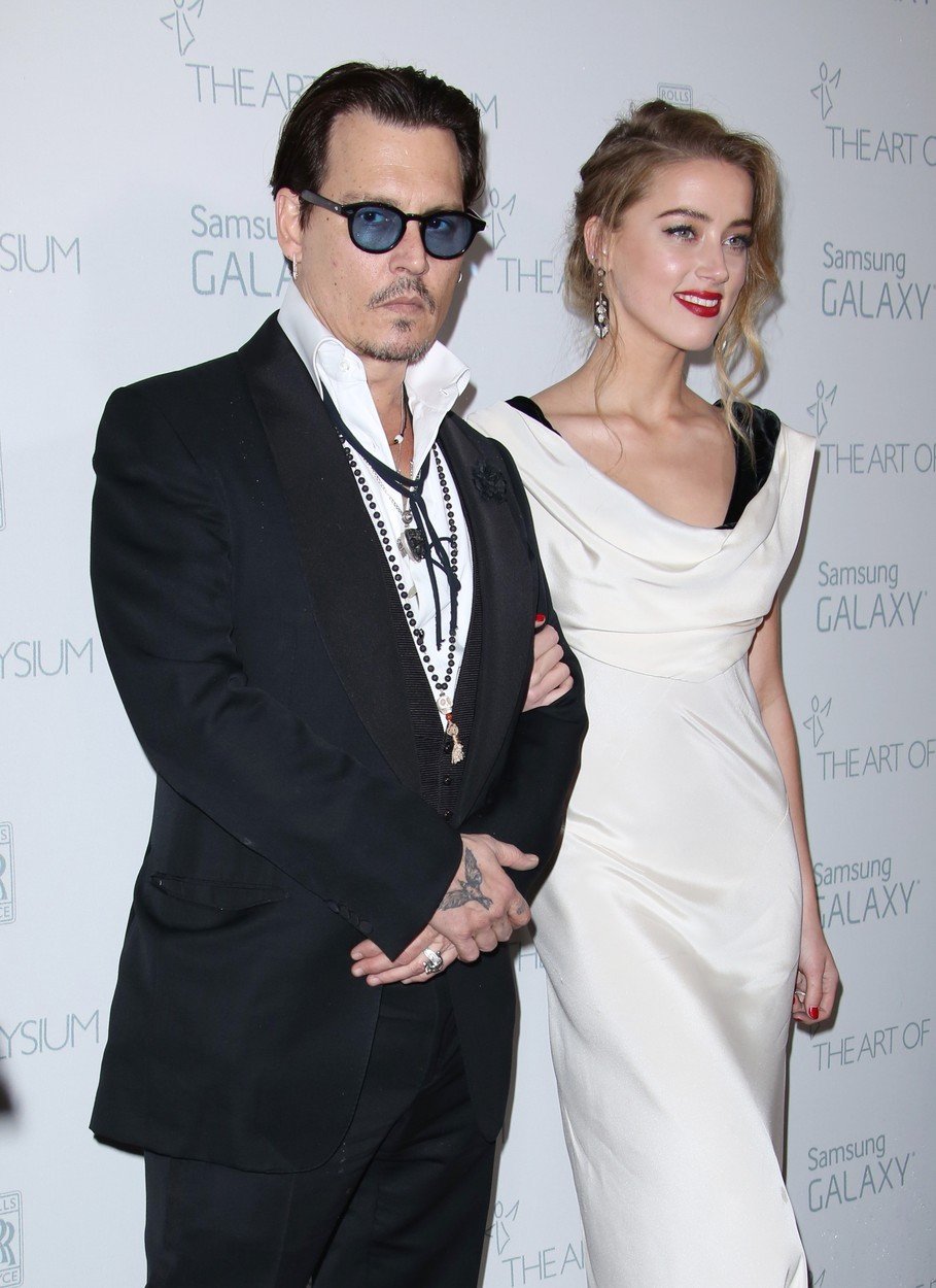 Johnny s novou snoubenkou Amber Heard.