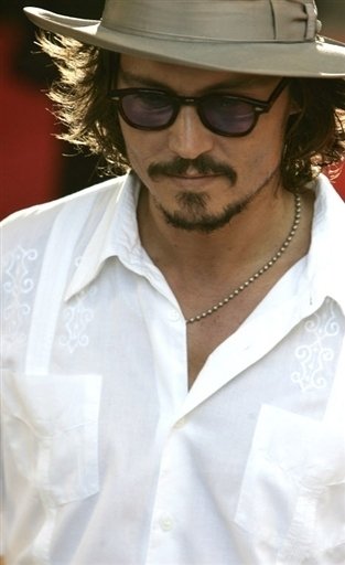a ´pirát z Karibiku´ Johnny Depp.