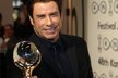 John Travolta rozdával úsměvy na všechny strany, ze své ceny byl naprosto nadšený